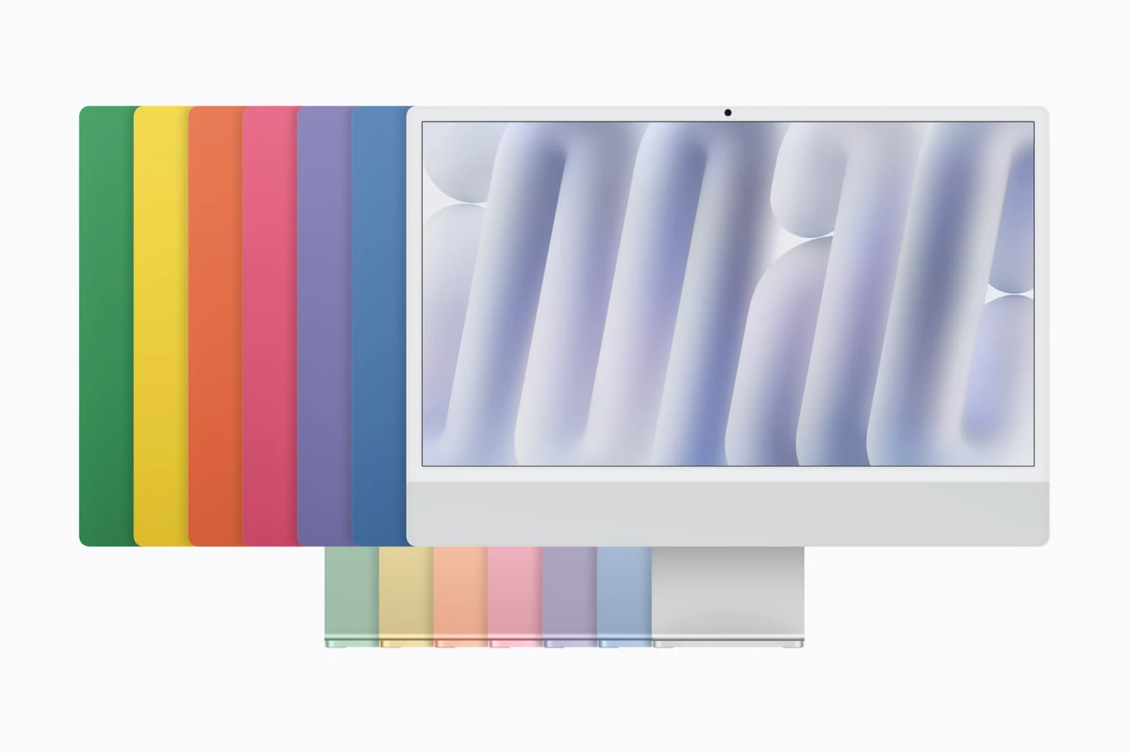 Stříbrný iMac zepředu, za ním vějíř zadních stran v zelené, žluté, oranžové, růžové, fialové a modré barvě